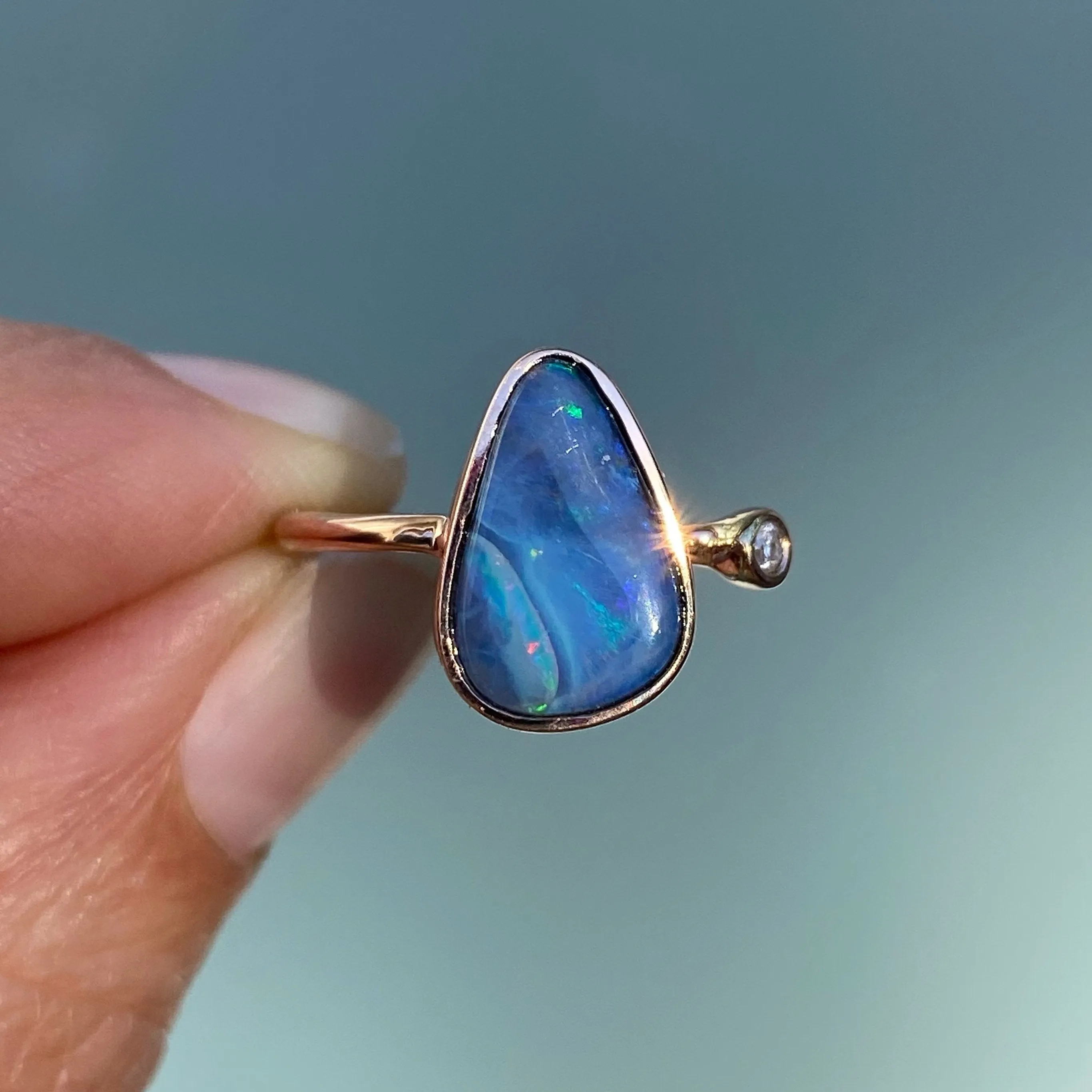 Rainbow River Dali Blue Boulder Opal and Diamond Rose Gold Ring