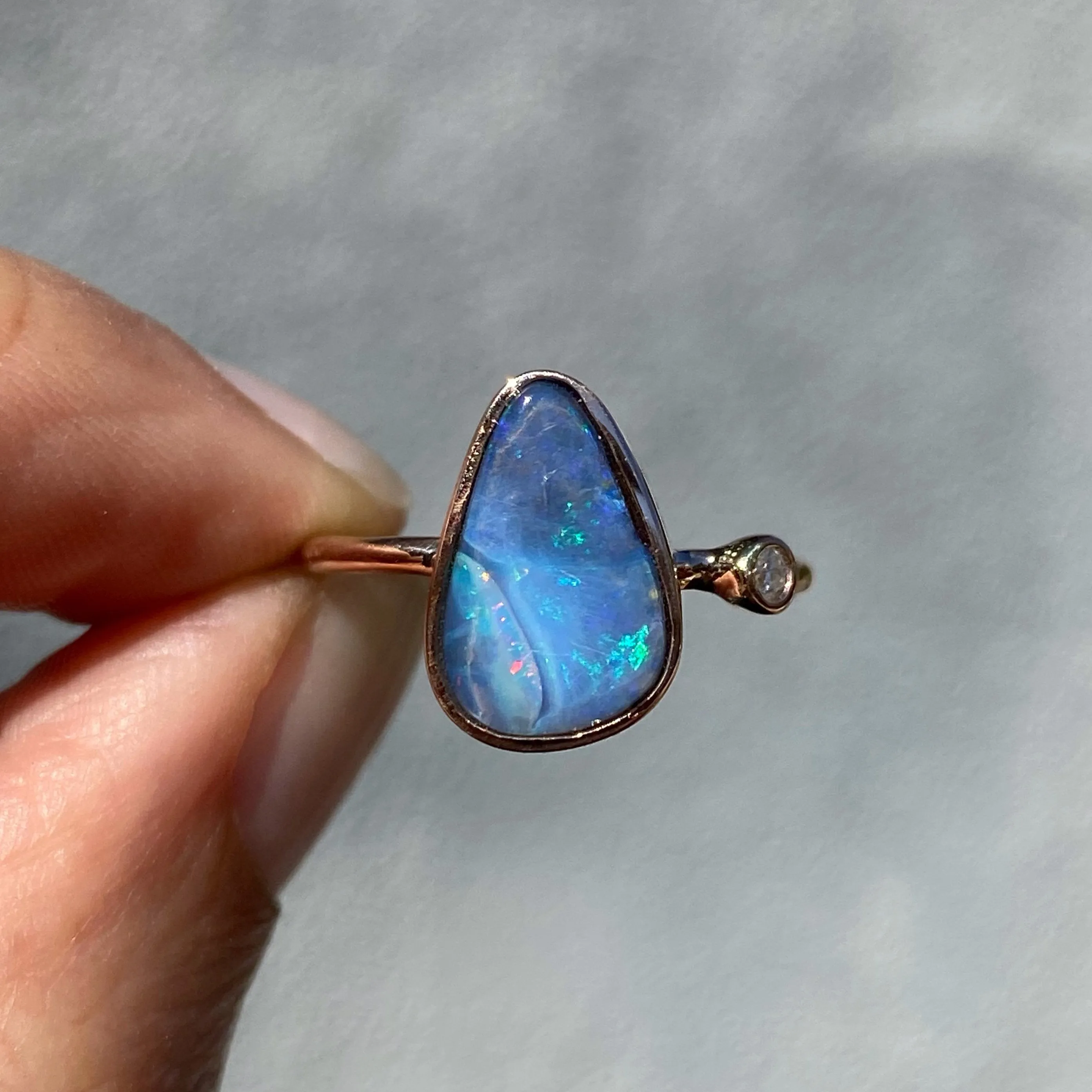 Rainbow River Dali Blue Boulder Opal and Diamond Rose Gold Ring